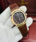 Patek Philippe Nautilus Leather Strap Watch.